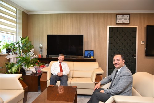 Kaymakamımız Cemal Hüsnü ÇAYKARA Manisa İl Sağlık Müdürü Doç. Dr. M. Emre Erkuş'u Makamında Ziyaret Etti